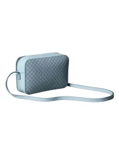 Calvin Klein Emblem Allover Print Crossbody Bag in Palest Blue AOP