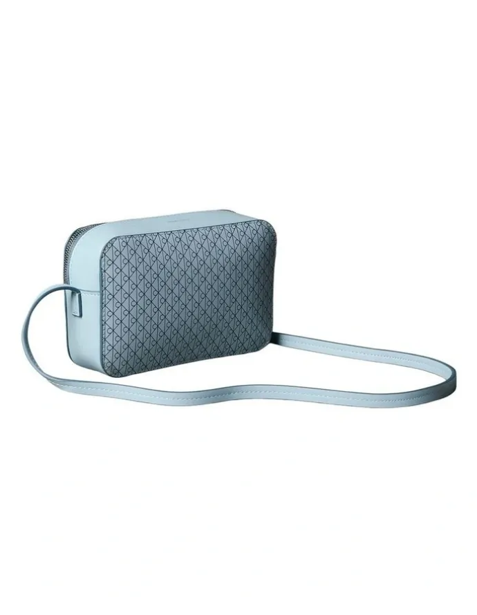 Calvin Klein Emblem Allover Print Crossbody Bag in Palest Blue AOP