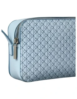 Calvin Klein Emblem Allover Print Crossbody Bag in Palest Blue AOP