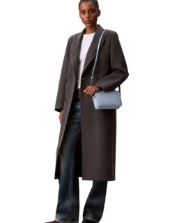 Calvin Klein Emblem Allover Print Crossbody Bag in Palest Blue AOP