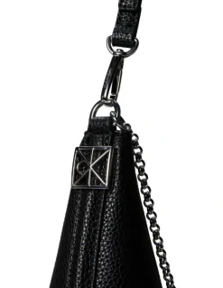 Calvin Klein Emblem Hardware Pebble Shoulder Bag in Black