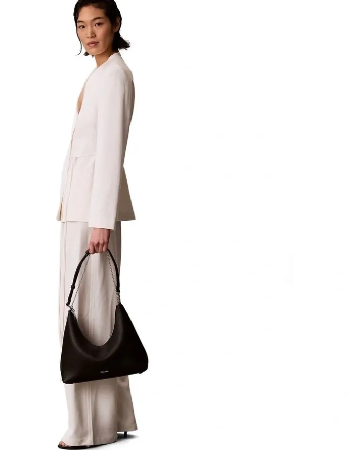 Calvin Klein Emblem Hardware Pebble Shoulder Bag in Black