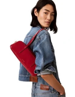 Calvin Klein Glossy Embossed Logo Bauletto Shoulder Bag in Bordeaux Wine