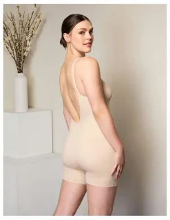 Cupid Shapewear Dress Rehearsal Mid-Thigh Low Back Shapewear Bodysuit in Warm Beige