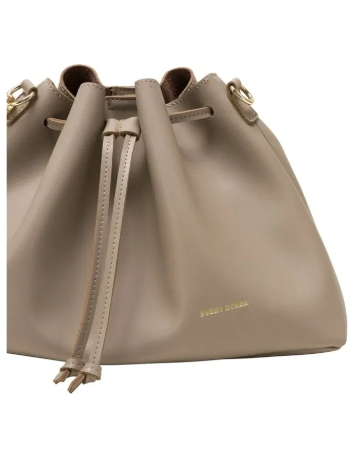 Every Other DRAWSTRING SHOULDER CROSS BODY IN TAUPE