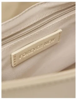 Forever New Carly Curve Lock Shoulder Bag in Cream