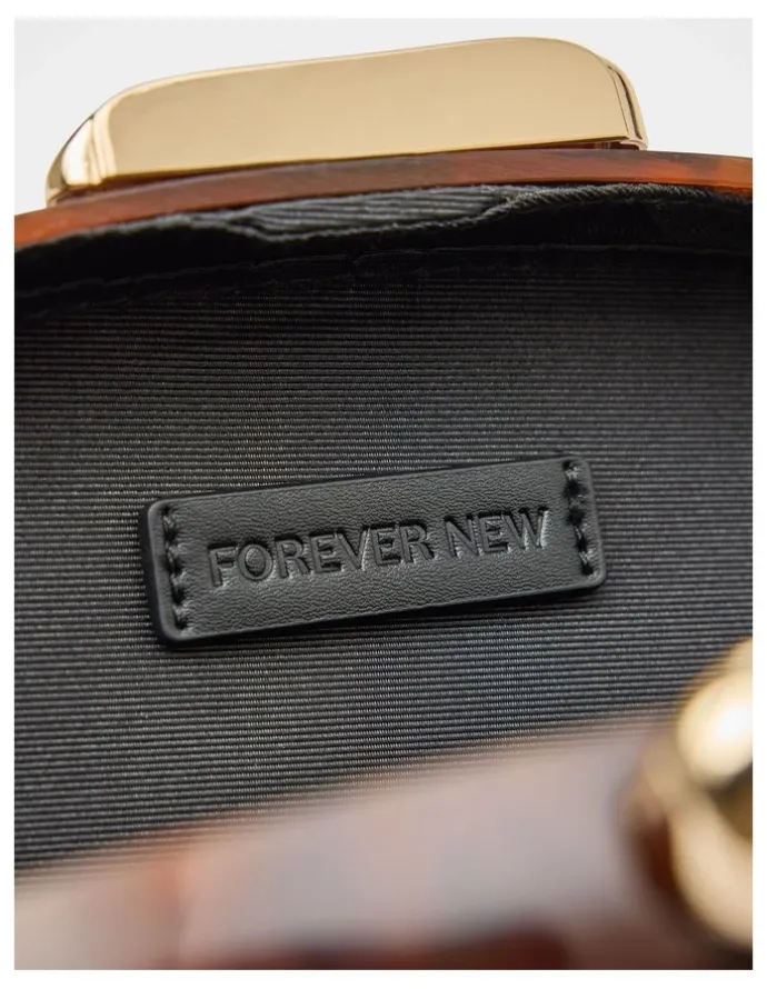Forever New Peyton Oval Hardcase Clutch in Brown