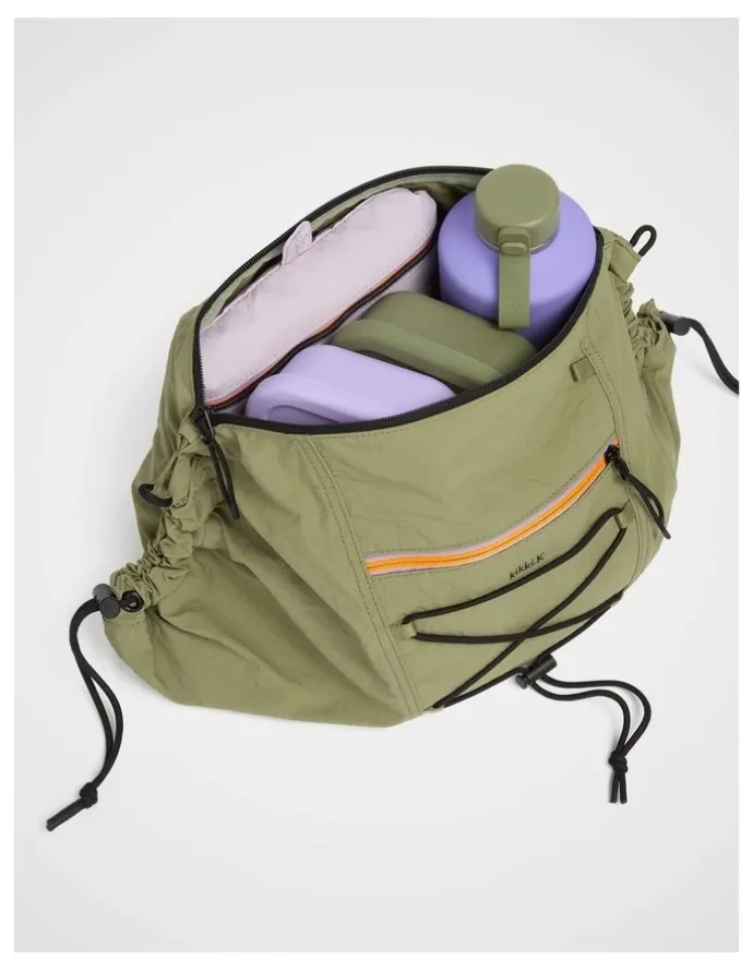 kikki.K Trek. Sling Bag in Moss
