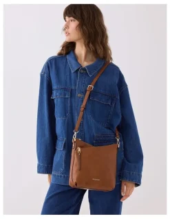 Madison Accessories Maya Medium Double Angled Zip Sling Crossbody Bag in Brown
