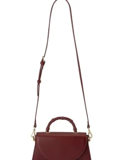 Olga Berg Phoebe Bamboo Top Handle Bag in Burgundy