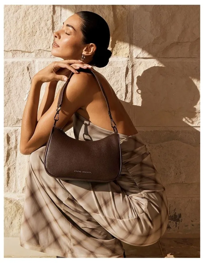 Status Anxiety Look Both Ways Crossbody Bag in Brown