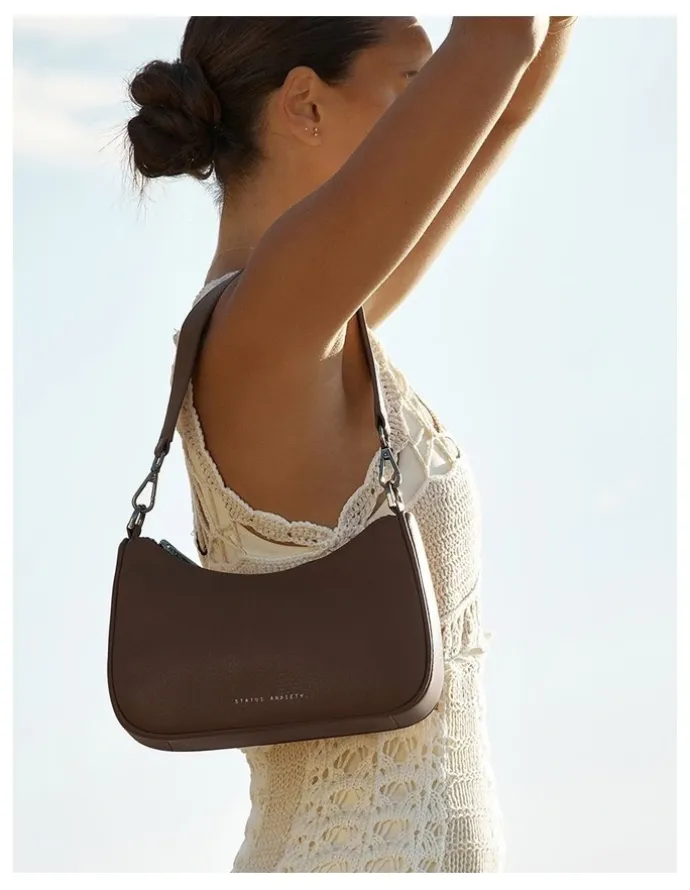 Status Anxiety Look Both Ways Crossbody Bag in Brown
