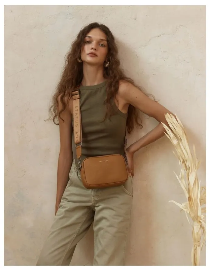 Status Anxiety Plunder Crossbody Bag with Dual Straps in Camel
