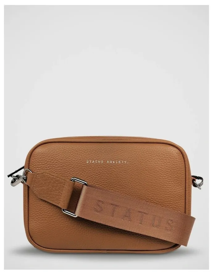 Status Anxiety Plunder Crossbody Bag with Dual Straps in Camel
