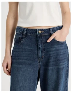 There After Mid Rise Distressed Wide Leg Jeans in Mid Blue