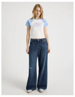 There After Mid Rise Distressed Wide Leg Jeans in Mid Blue